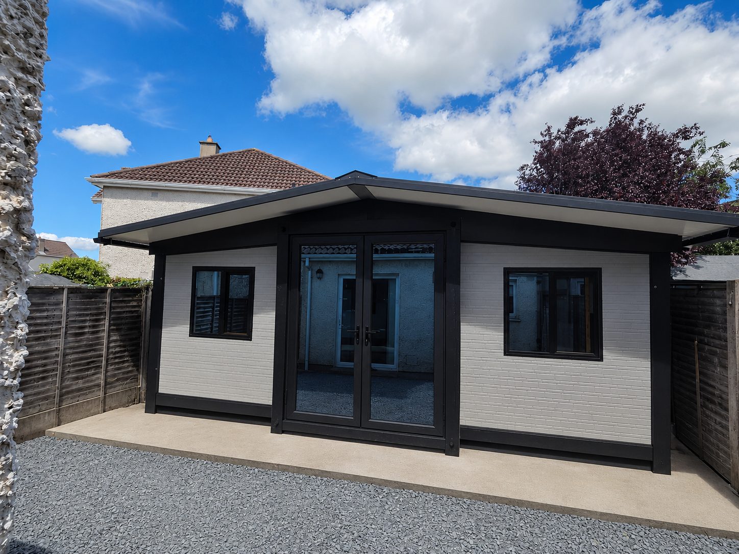 The Glendalough Lodge modular home installed in an Irish back garden