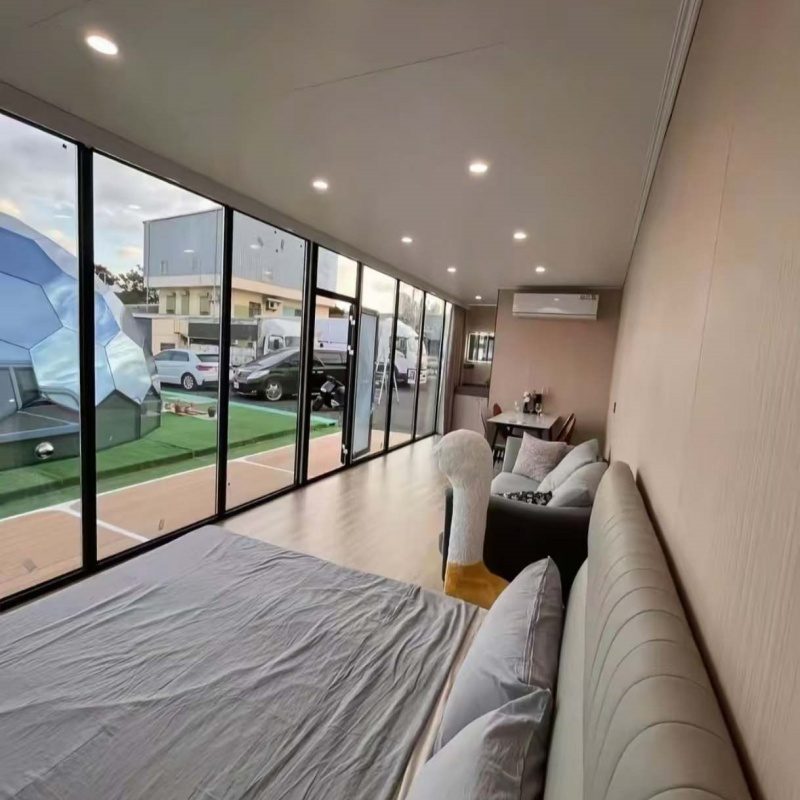 Interior of The Tara One-Bed looking out through full-height glazing
